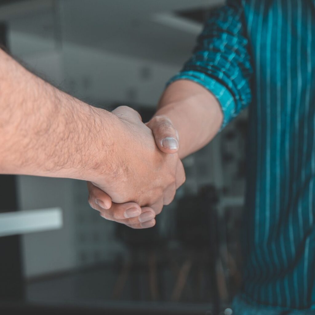 Two people shaking hands